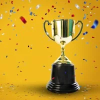 Siegerpokal und Konfetti